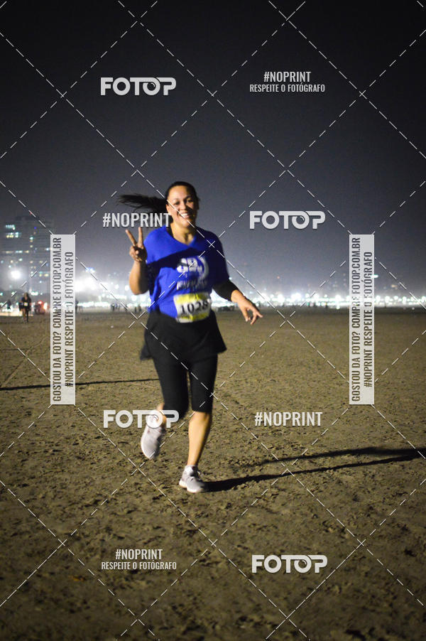 Buy your photos of the eventJovem Pan Night Run Santos on Fotop