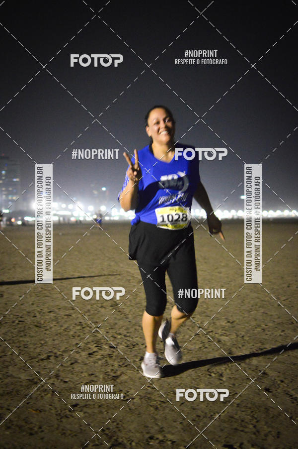 Buy your photos of the eventJovem Pan Night Run Santos on Fotop