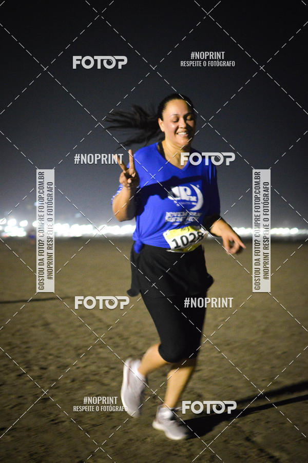 Buy your photos of the eventJovem Pan Night Run Santos on Fotop