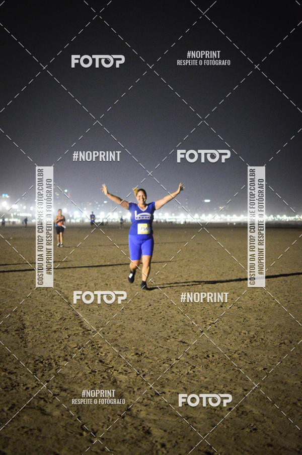 Buy your photos of the eventJovem Pan Night Run Santos on Fotop