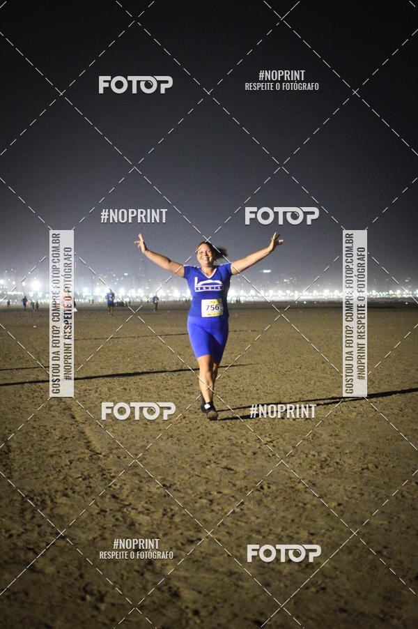 Buy your photos of the eventJovem Pan Night Run Santos on Fotop