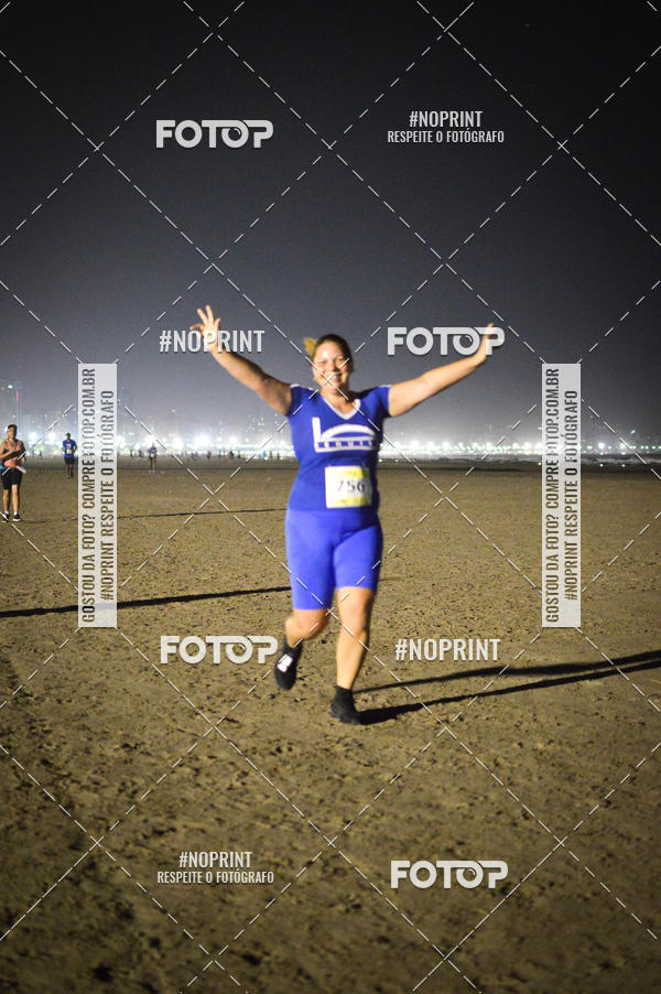Buy your photos of the eventJovem Pan Night Run Santos on Fotop