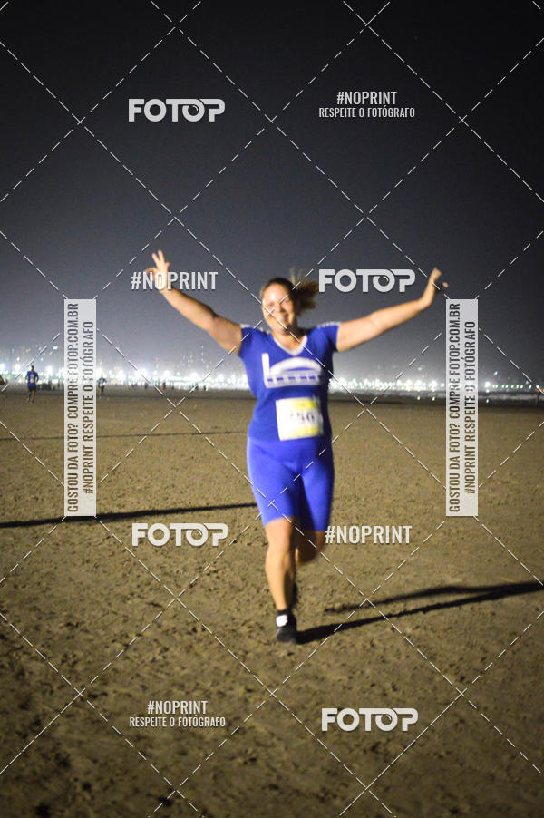 Buy your photos of the eventJovem Pan Night Run Santos on Fotop