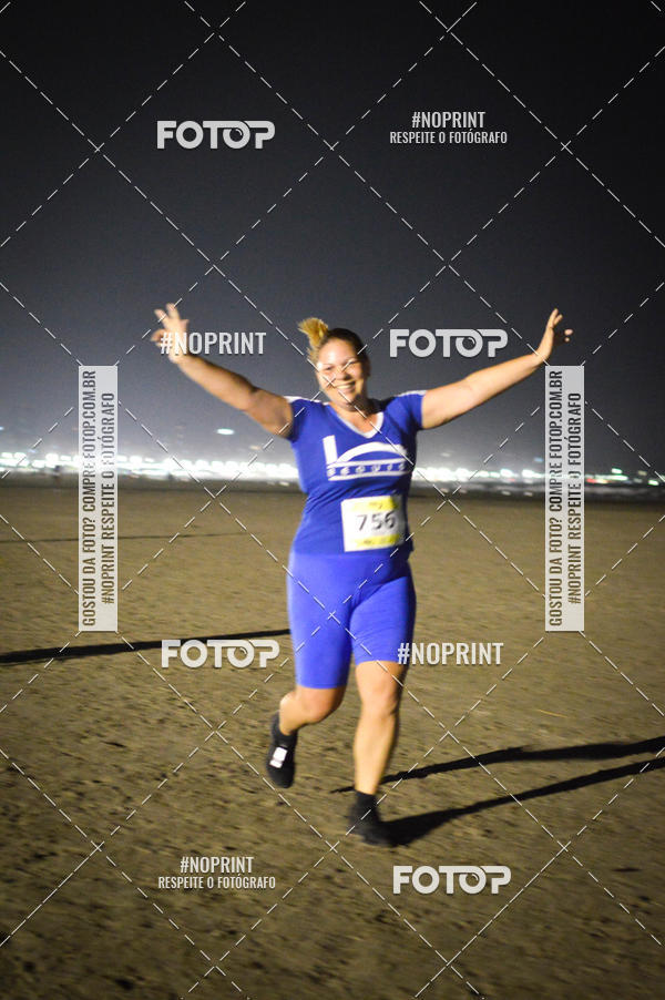 Buy your photos of the eventJovem Pan Night Run Santos on Fotop