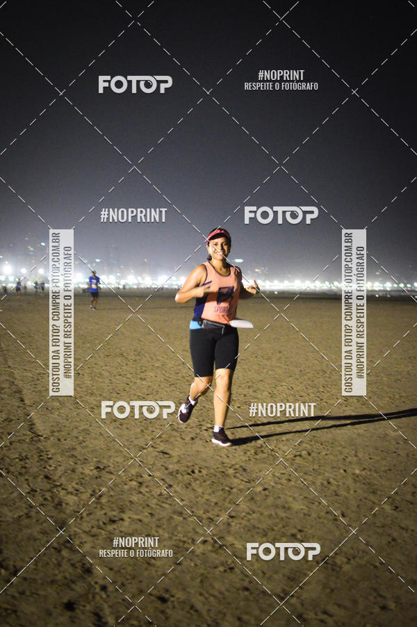Buy your photos of the eventJovem Pan Night Run Santos on Fotop