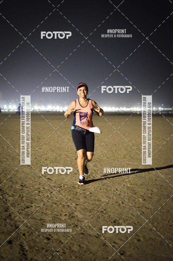 Buy your photos of the eventJovem Pan Night Run Santos on Fotop