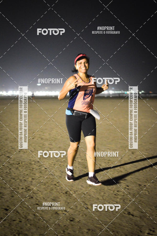 Buy your photos of the eventJovem Pan Night Run Santos on Fotop
