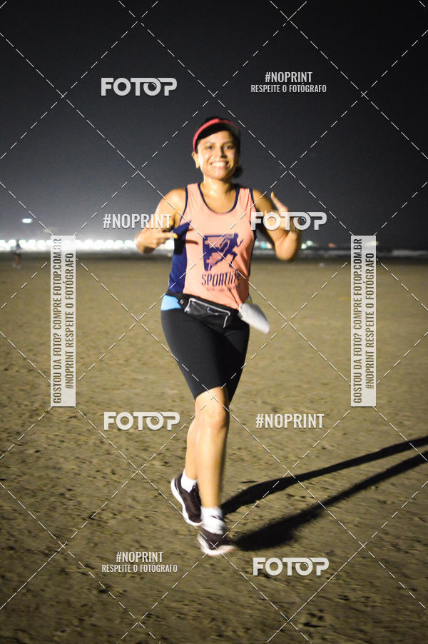 Buy your photos of the eventJovem Pan Night Run Santos on Fotop