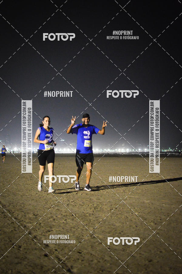Buy your photos of the eventJovem Pan Night Run Santos on Fotop