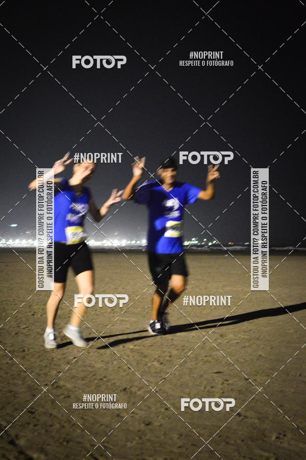 Buy your photos of the eventJovem Pan Night Run Santos on Fotop