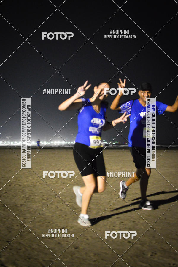 Buy your photos of the eventJovem Pan Night Run Santos on Fotop