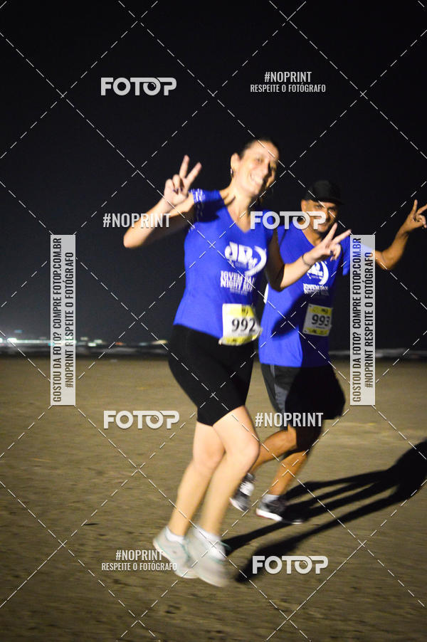 Buy your photos of the eventJovem Pan Night Run Santos on Fotop