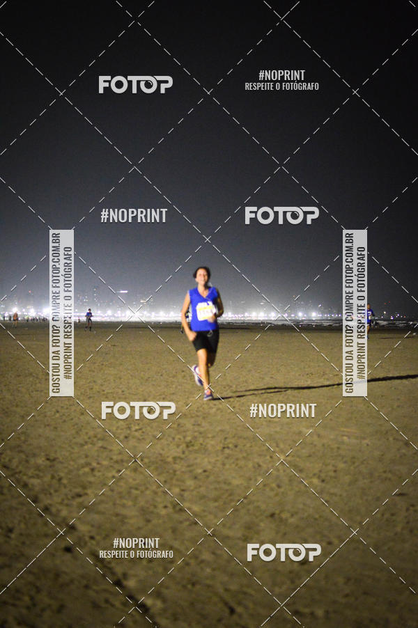 Buy your photos of the eventJovem Pan Night Run Santos on Fotop
