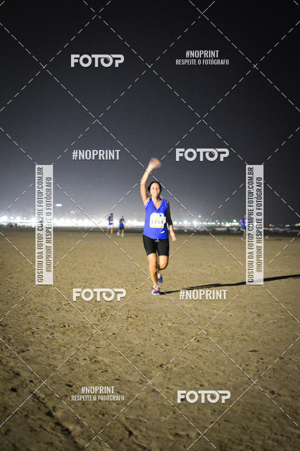 Buy your photos of the eventJovem Pan Night Run Santos on Fotop