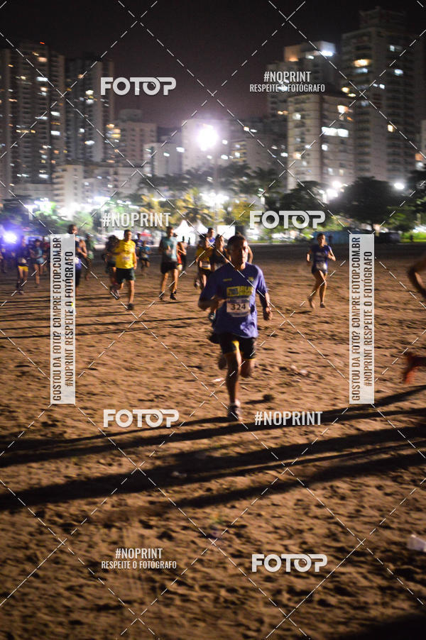 Buy your photos of the eventJovem Pan Night Run Santos on Fotop