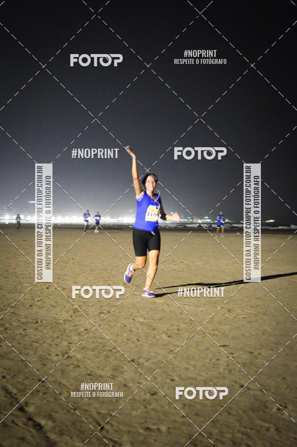 Buy your photos of the eventJovem Pan Night Run Santos on Fotop