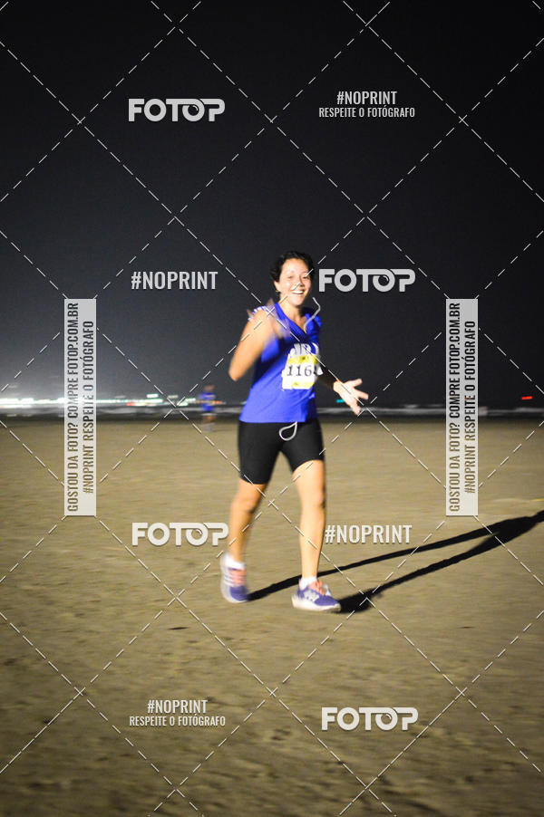 Buy your photos of the eventJovem Pan Night Run Santos on Fotop