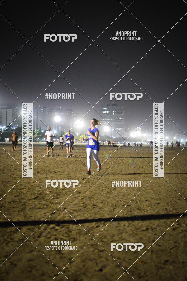 Buy your photos of the eventJovem Pan Night Run Santos on Fotop