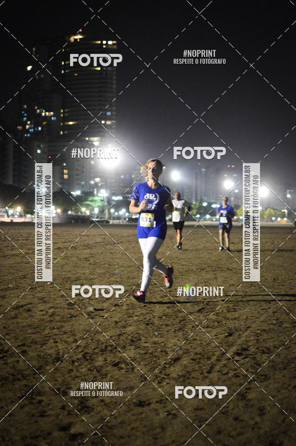 Buy your photos of the eventJovem Pan Night Run Santos on Fotop