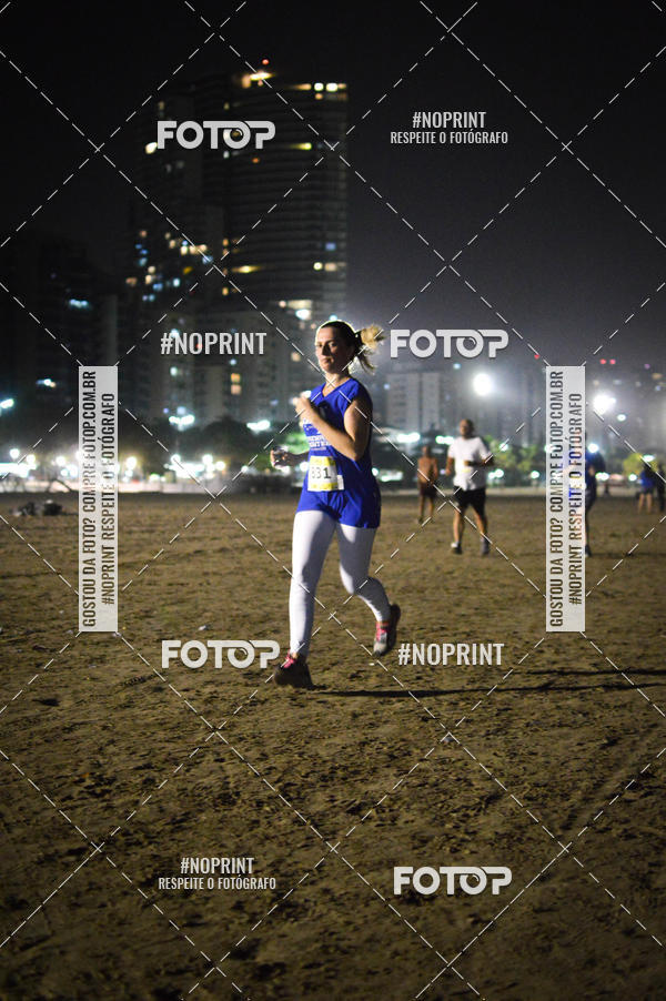 Buy your photos of the eventJovem Pan Night Run Santos on Fotop