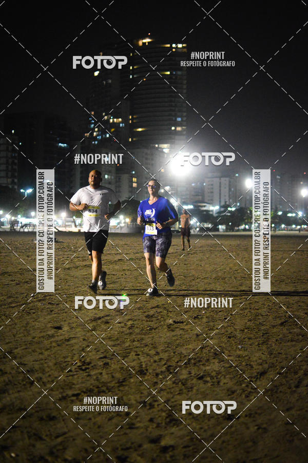Buy your photos of the eventJovem Pan Night Run Santos on Fotop