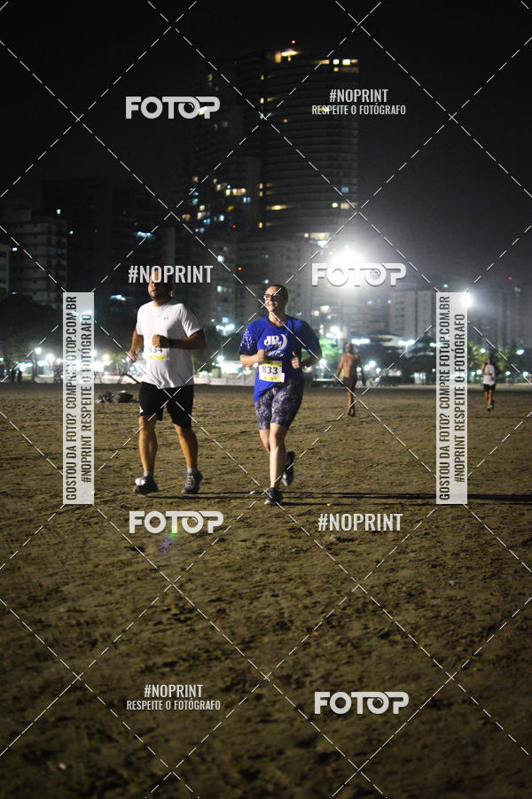 Buy your photos of the eventJovem Pan Night Run Santos on Fotop