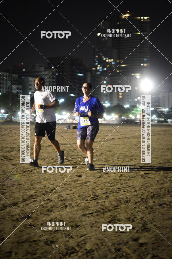 Buy your photos of the eventJovem Pan Night Run Santos on Fotop