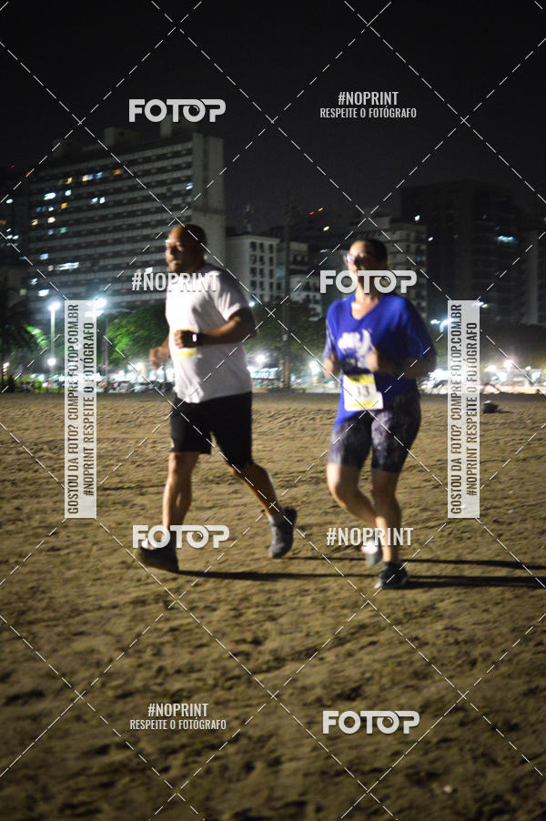 Buy your photos of the eventJovem Pan Night Run Santos on Fotop