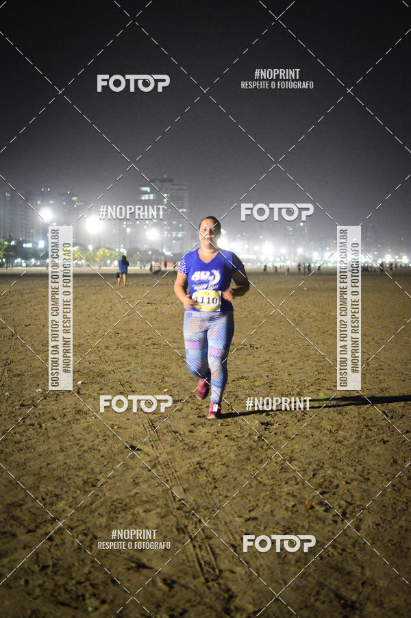 Buy your photos of the eventJovem Pan Night Run Santos on Fotop