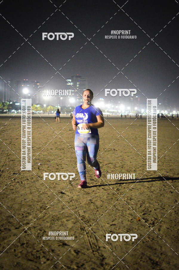 Buy your photos of the eventJovem Pan Night Run Santos on Fotop