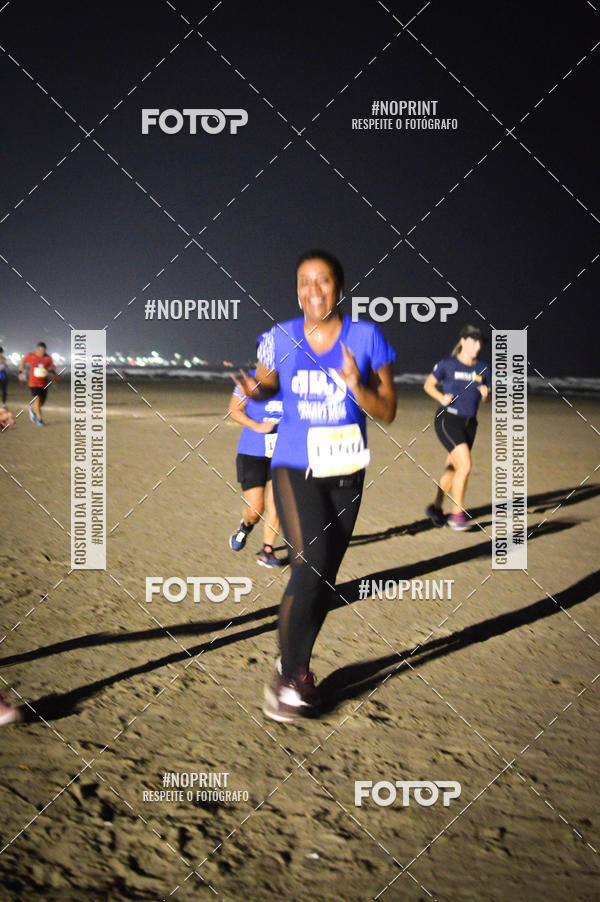 Buy your photos of the eventJovem Pan Night Run Santos on Fotop