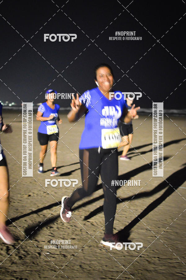 Buy your photos of the eventJovem Pan Night Run Santos on Fotop