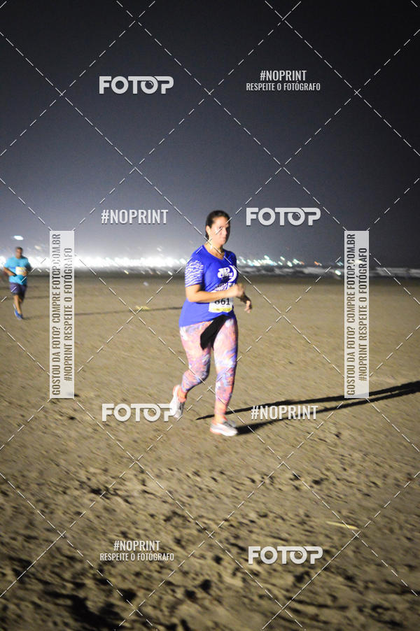 Buy your photos of the eventJovem Pan Night Run Santos on Fotop