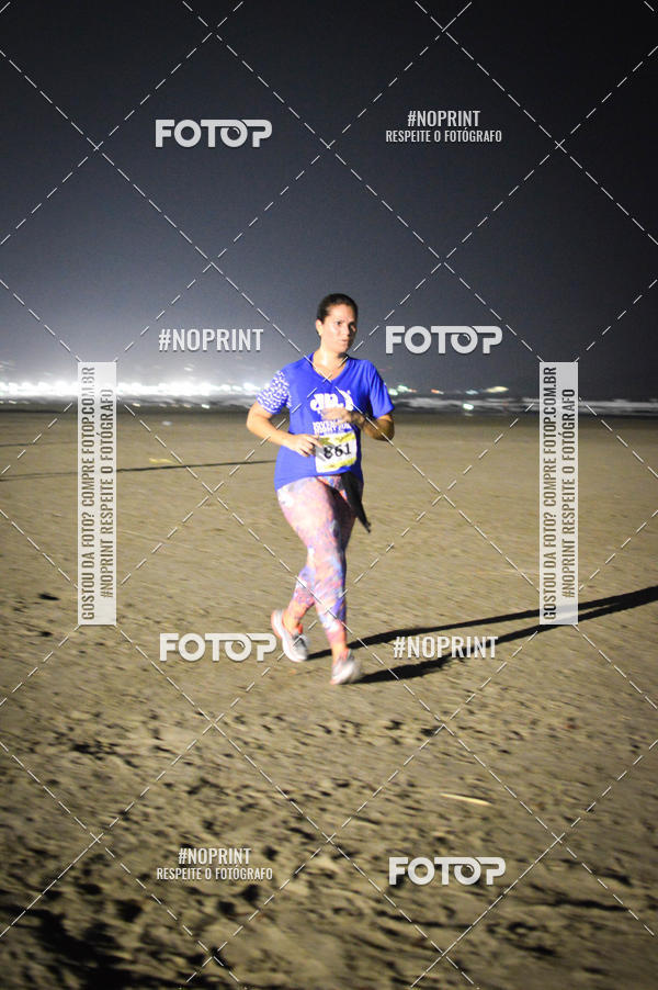 Buy your photos of the eventJovem Pan Night Run Santos on Fotop