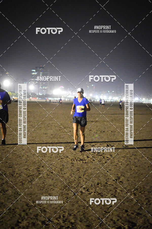 Buy your photos of the eventJovem Pan Night Run Santos on Fotop