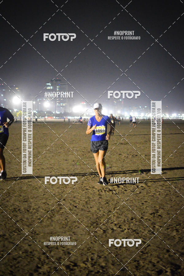 Buy your photos of the eventJovem Pan Night Run Santos on Fotop