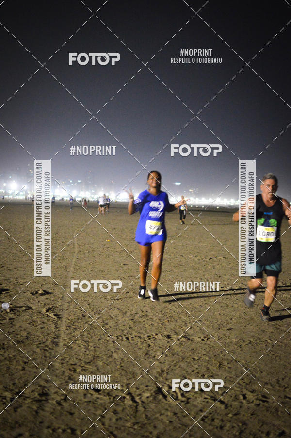 Buy your photos of the eventJovem Pan Night Run Santos on Fotop