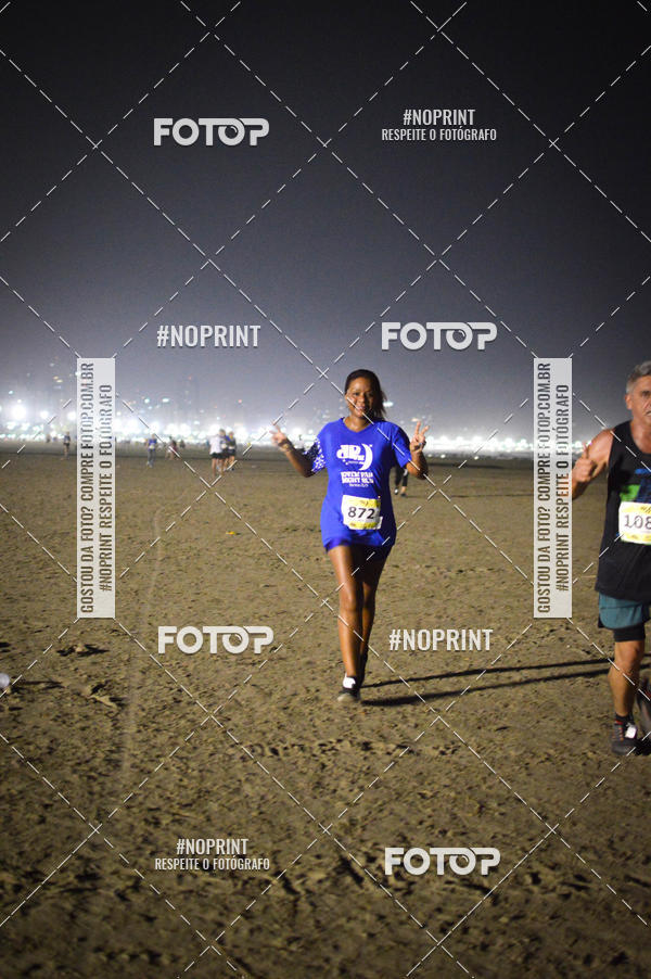 Buy your photos of the eventJovem Pan Night Run Santos on Fotop