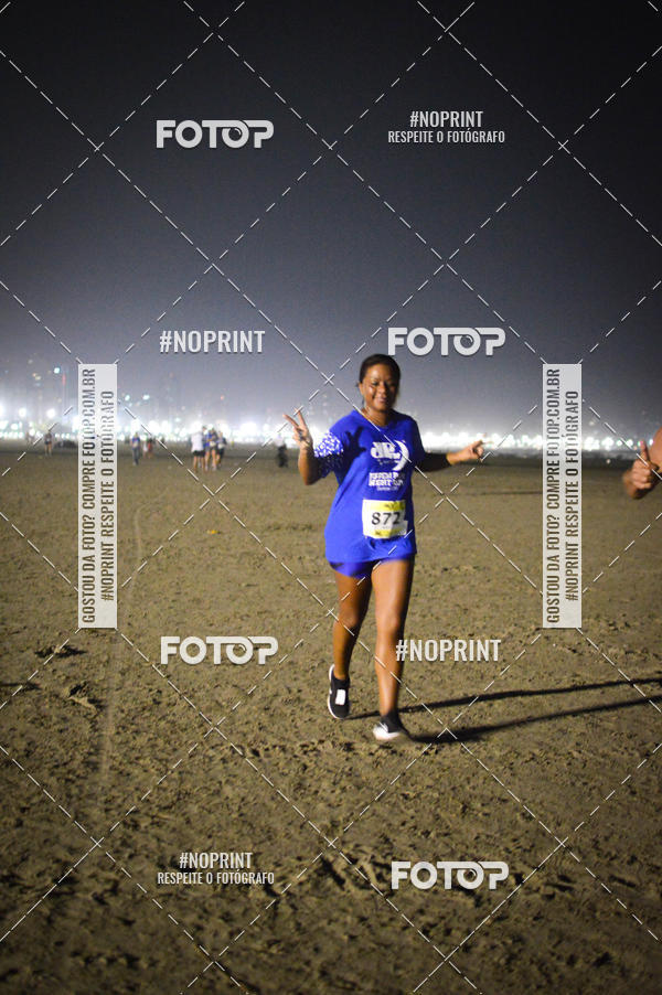 Buy your photos of the eventJovem Pan Night Run Santos on Fotop