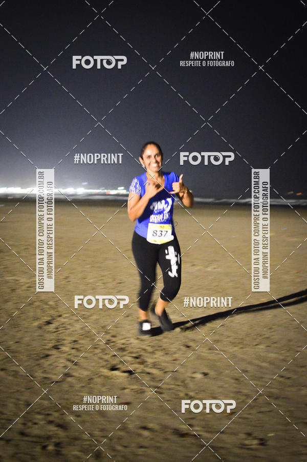 Buy your photos of the eventJovem Pan Night Run Santos on Fotop