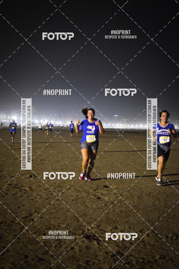 Buy your photos of the eventJovem Pan Night Run Santos on Fotop