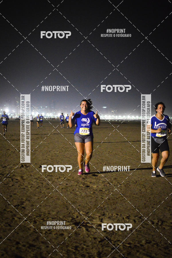 Buy your photos of the eventJovem Pan Night Run Santos on Fotop