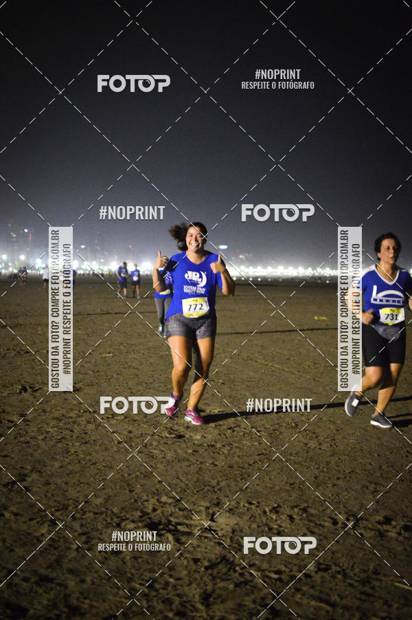Buy your photos of the eventJovem Pan Night Run Santos on Fotop