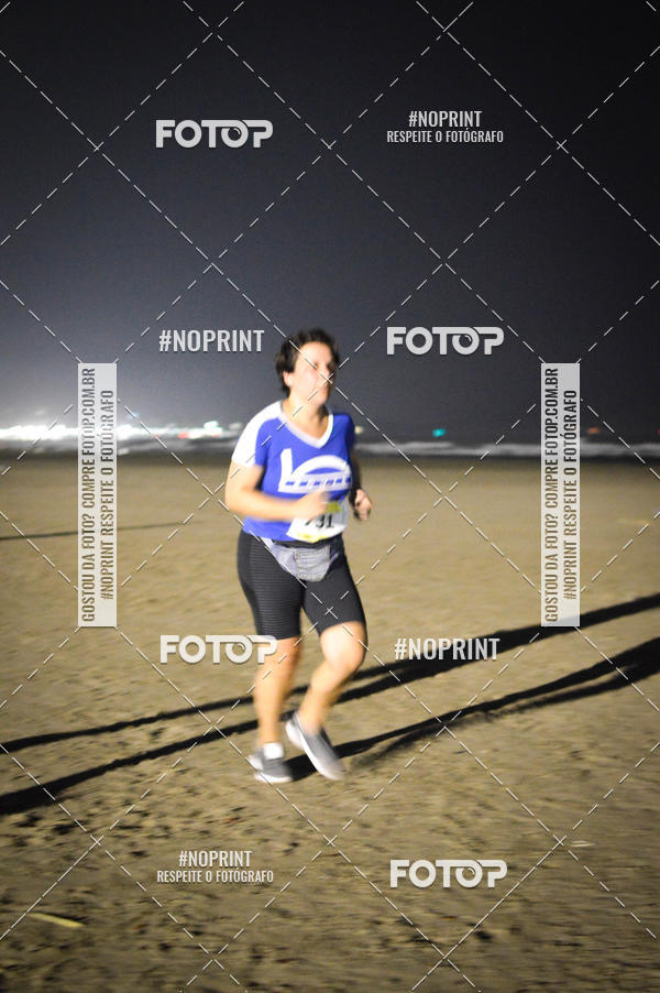 Buy your photos of the eventJovem Pan Night Run Santos on Fotop
