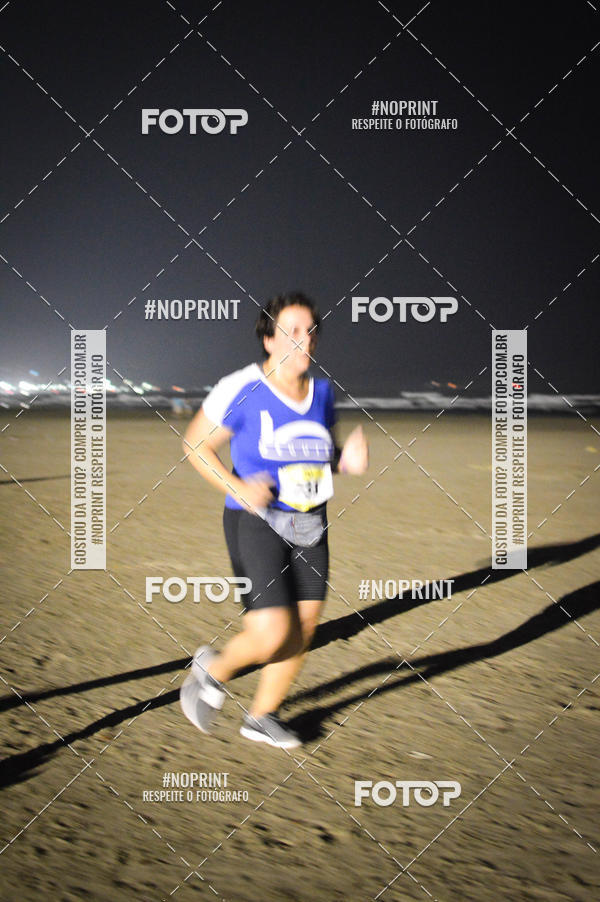 Buy your photos of the eventJovem Pan Night Run Santos on Fotop