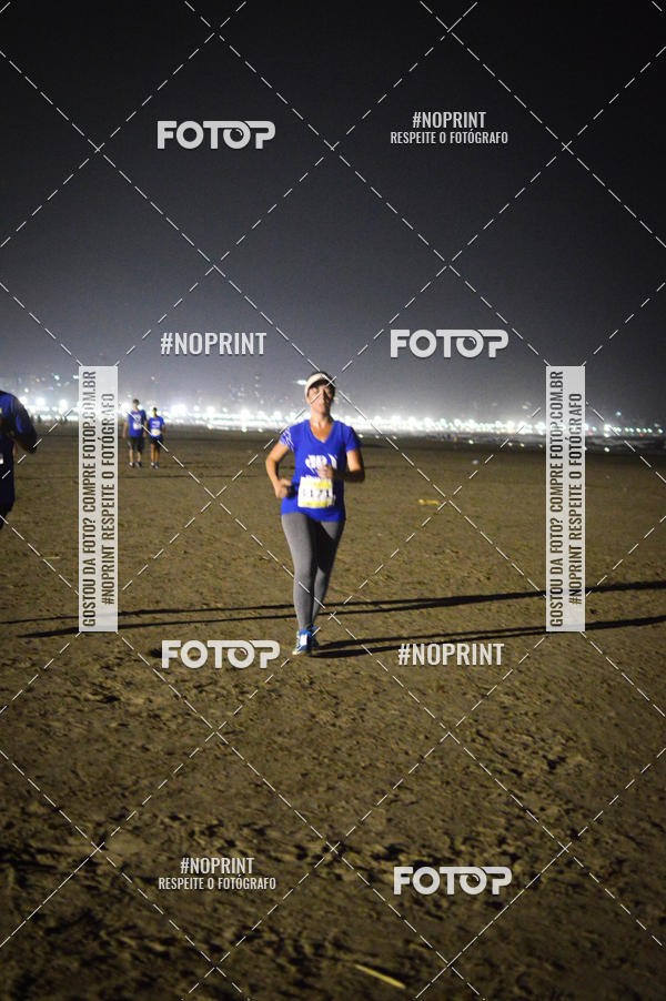 Buy your photos of the eventJovem Pan Night Run Santos on Fotop