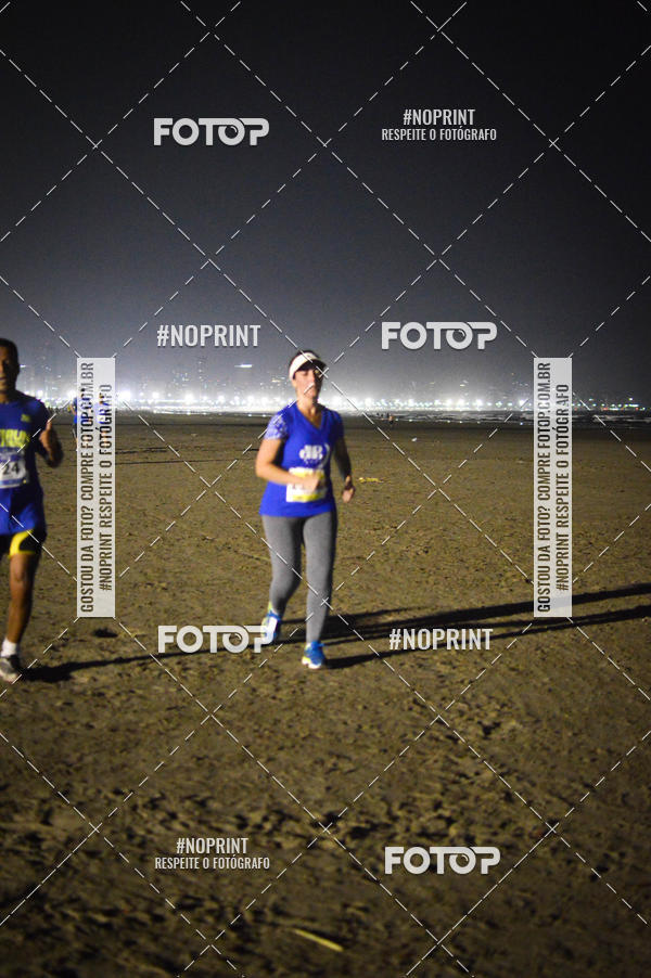 Buy your photos of the eventJovem Pan Night Run Santos on Fotop