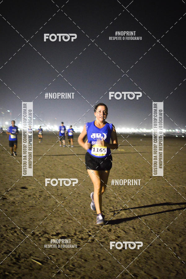 Buy your photos of the eventJovem Pan Night Run Santos on Fotop