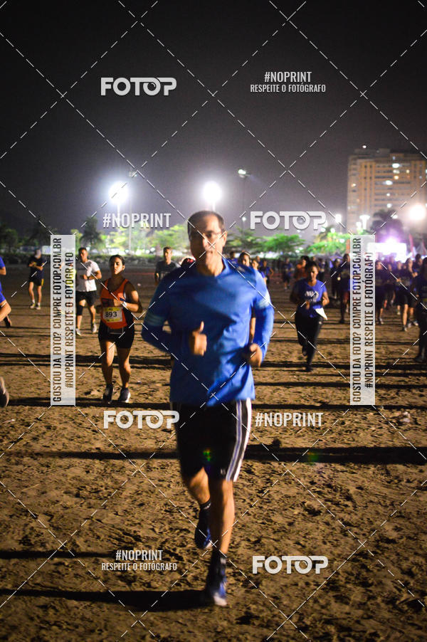 Buy your photos of the eventJovem Pan Night Run Santos on Fotop