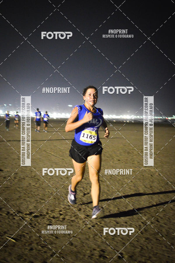 Buy your photos of the eventJovem Pan Night Run Santos on Fotop